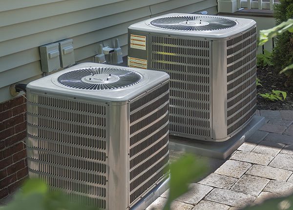two HVAC units outside